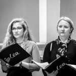 Two singers from the Lea Singers chamber choir